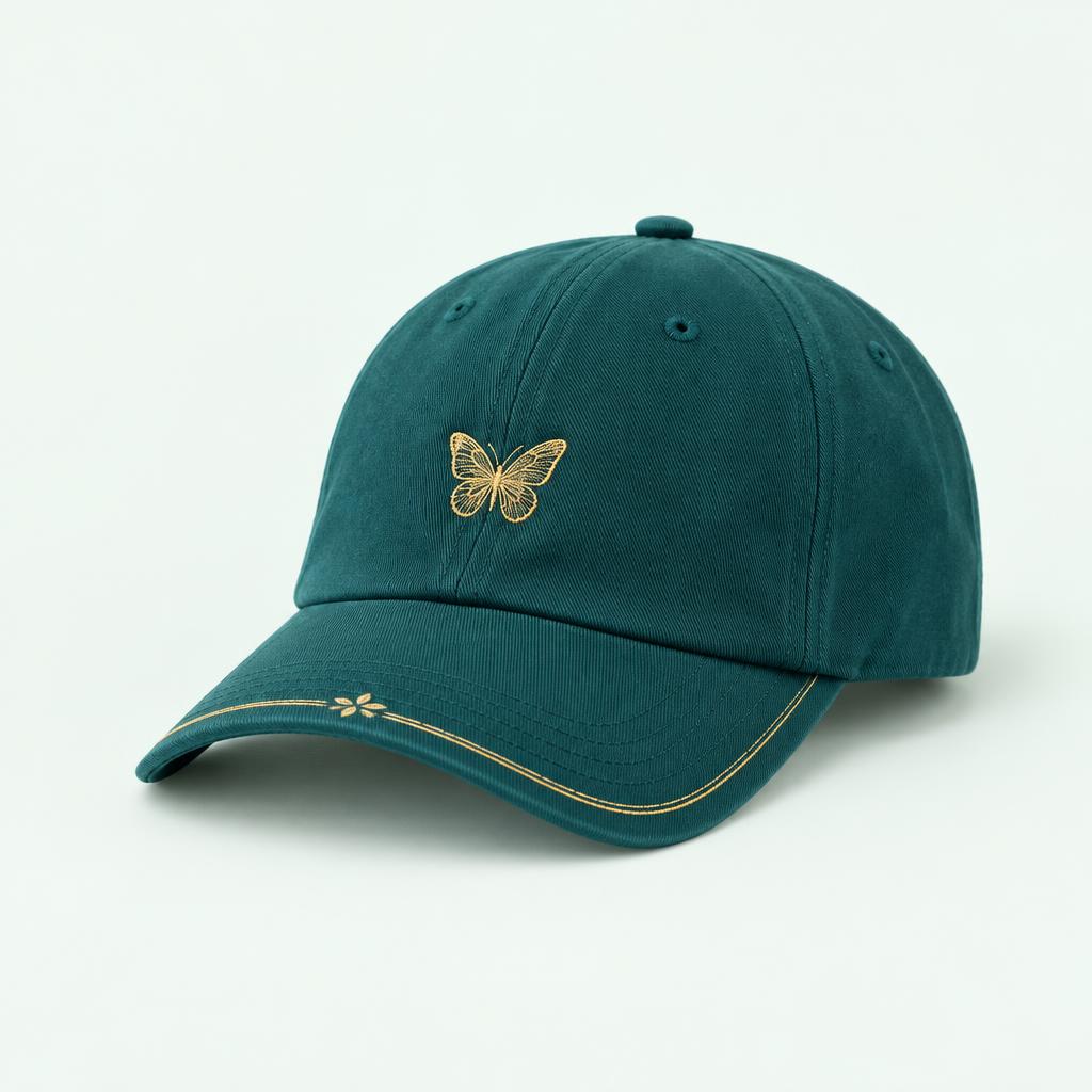Deep teal cap with gold butterfly embroidery design